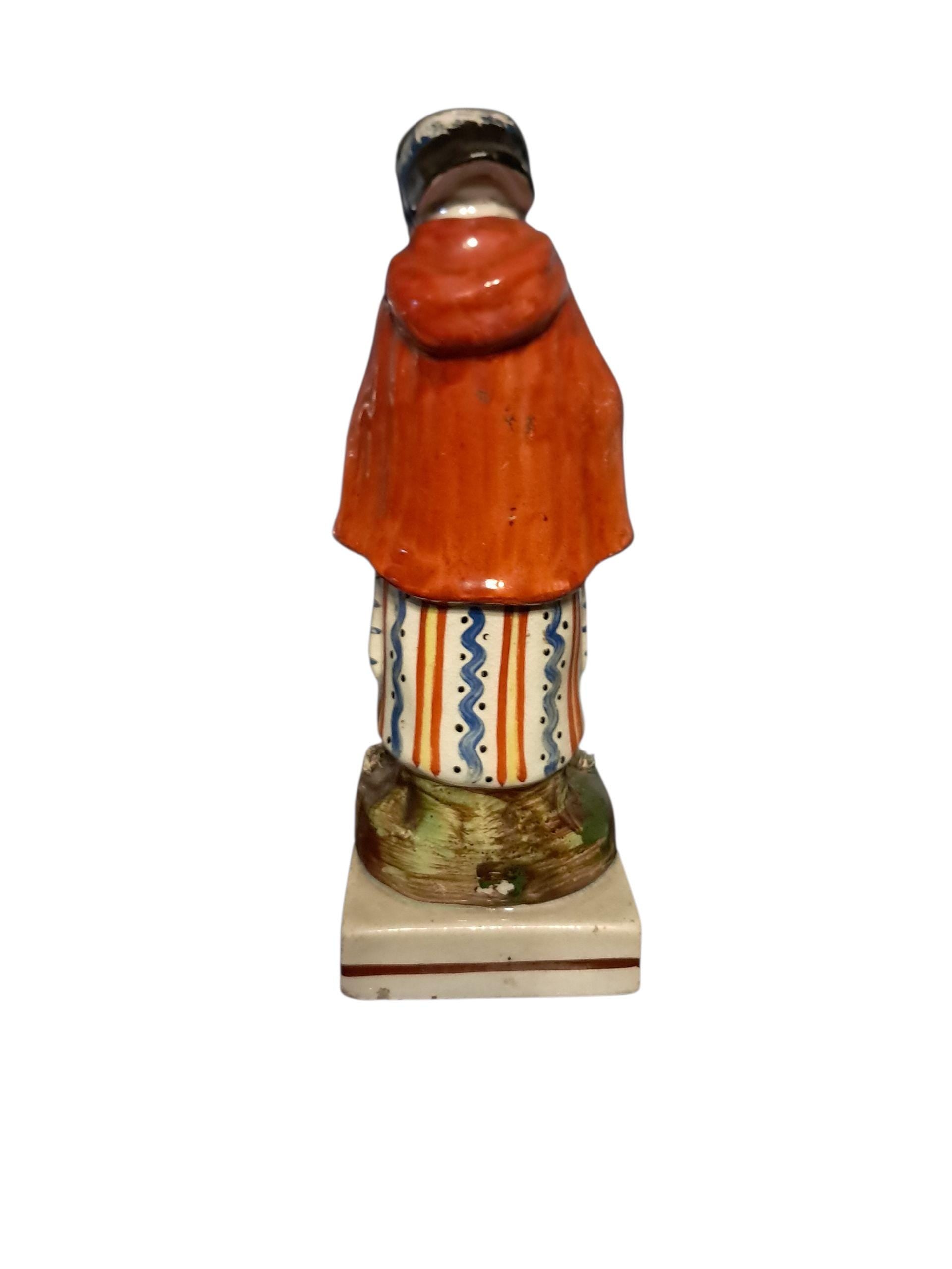 Earlier Staffordshire Figure of Old Age