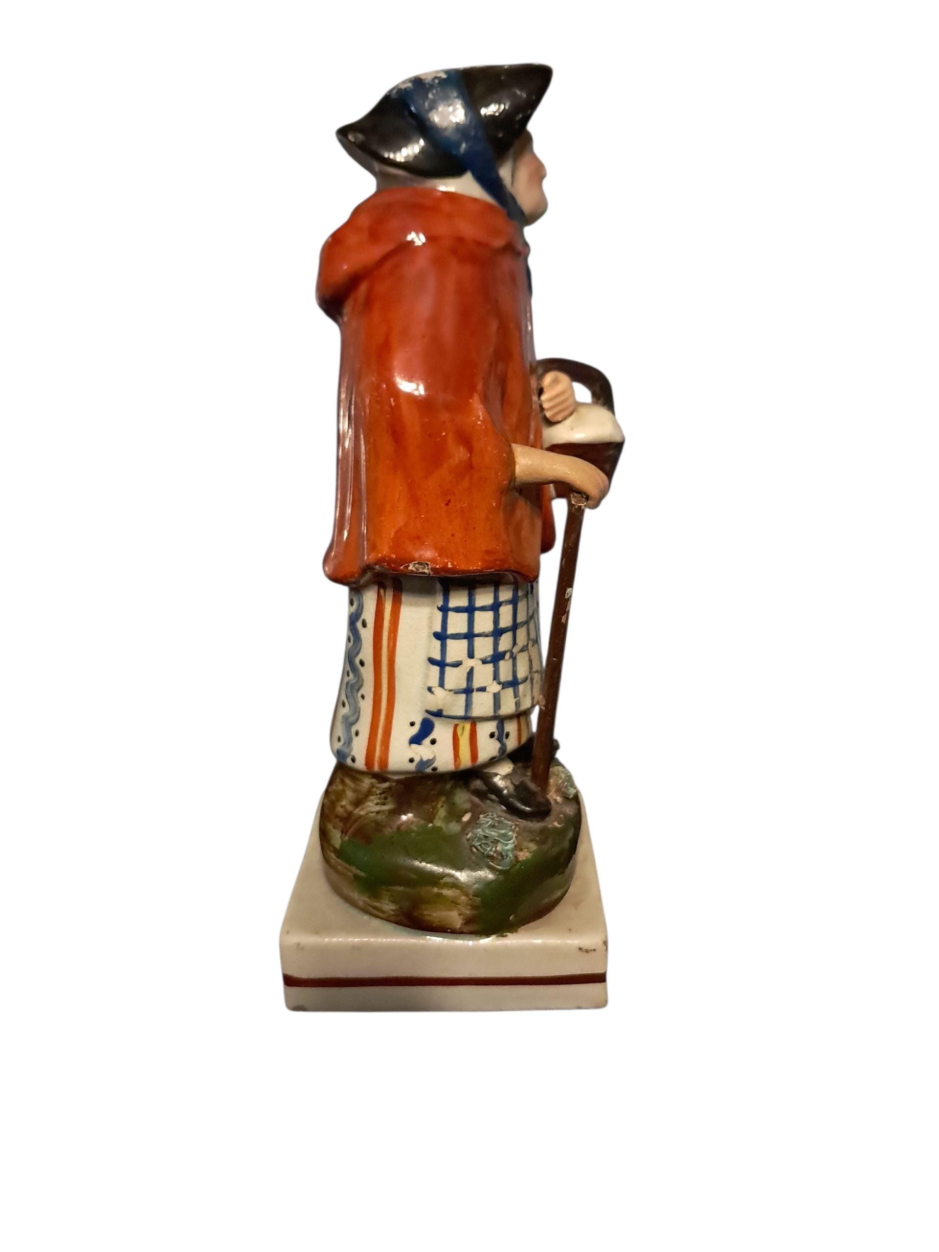 Earlier Staffordshire Figure of Old Age
